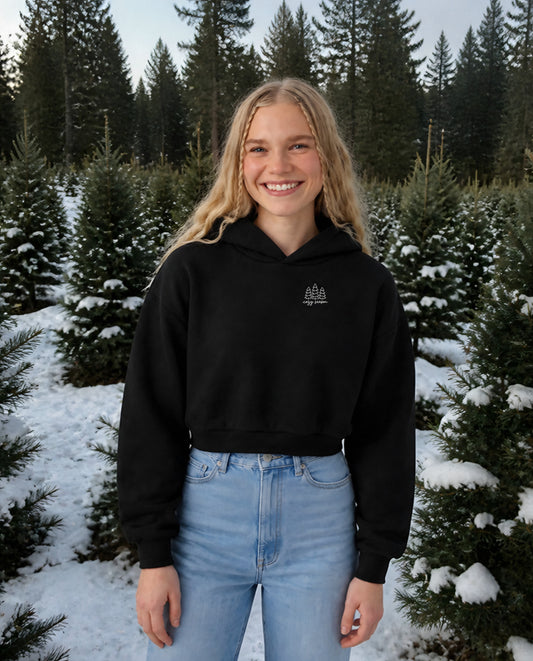 Cozy Season minimalist crop hoodie for women in Black, worn by model, lifestyle photo