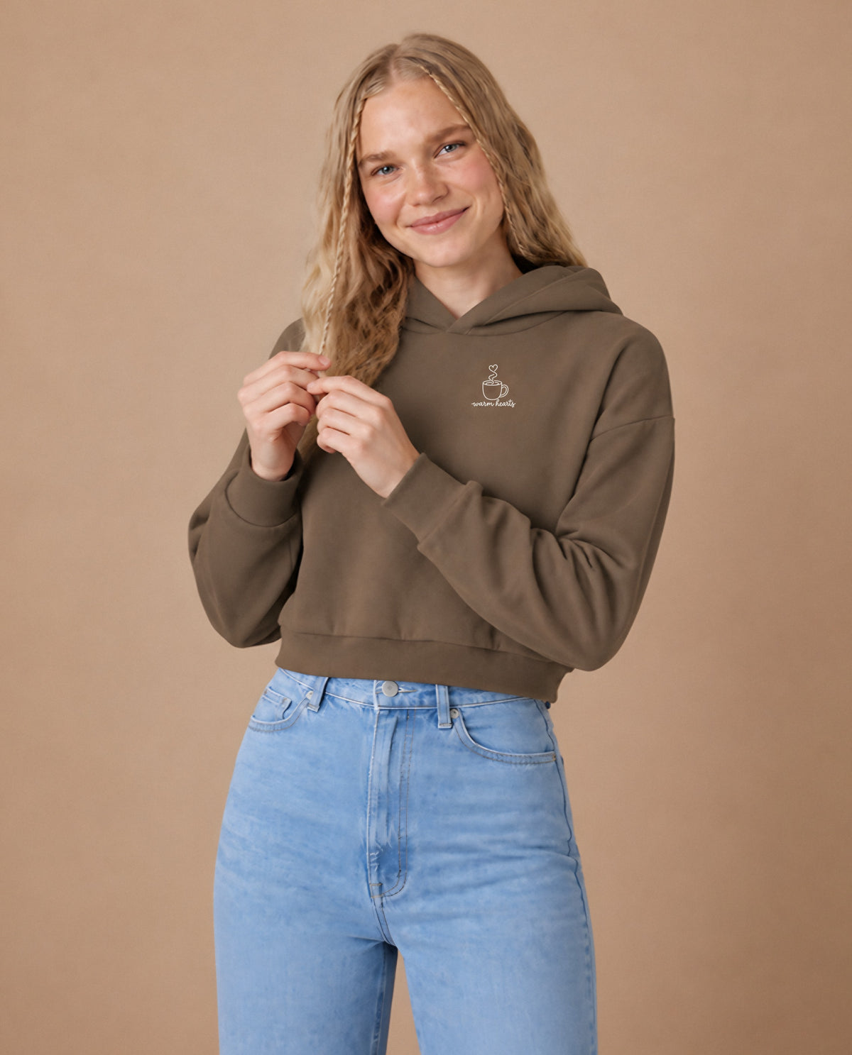 Warm Hearts minimalist crop hoodie for women in Coffee, worn by model, studio photo