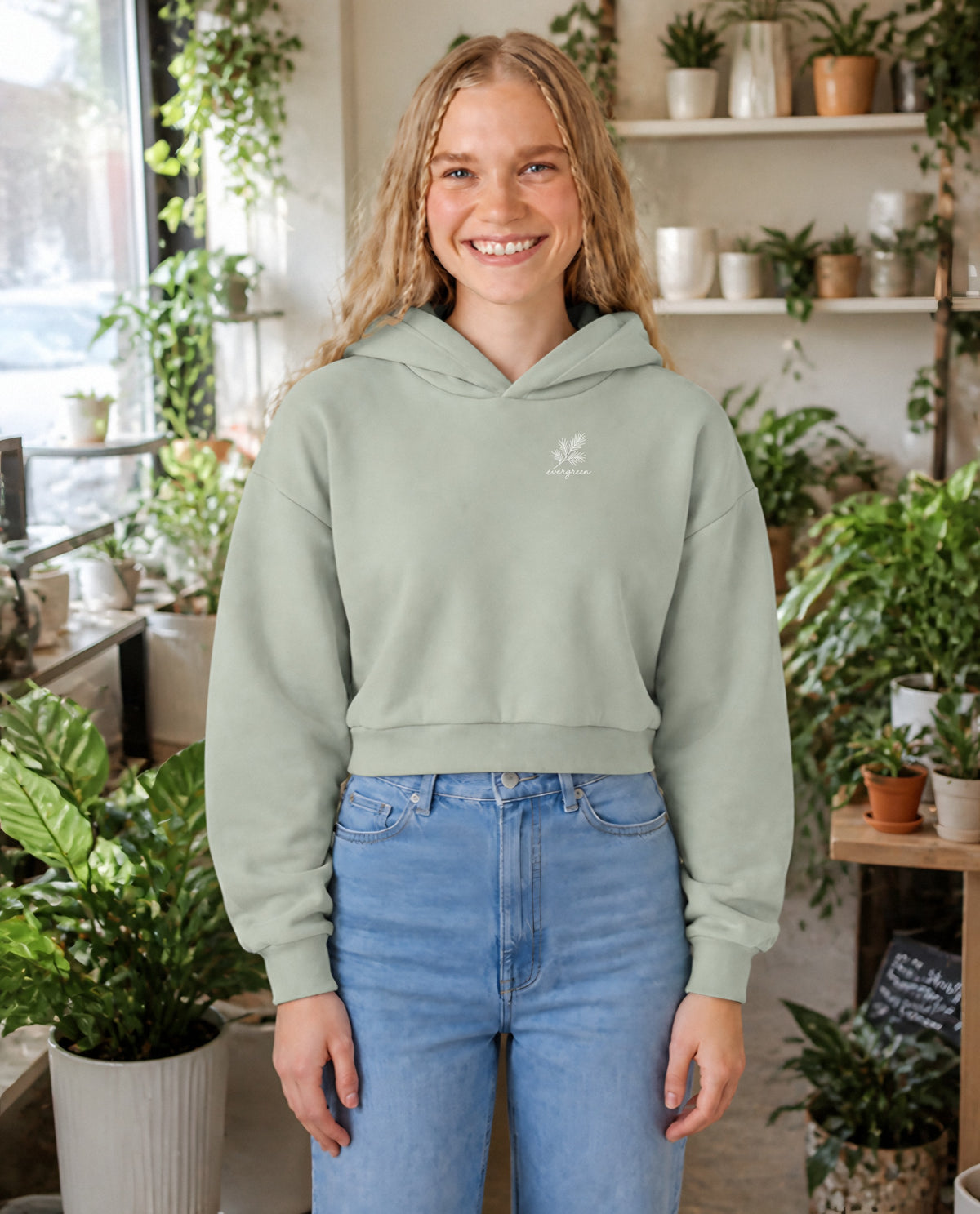 Evergreen minimalist crop hoodie for women in Matcha, worn by model, lifestyle photo