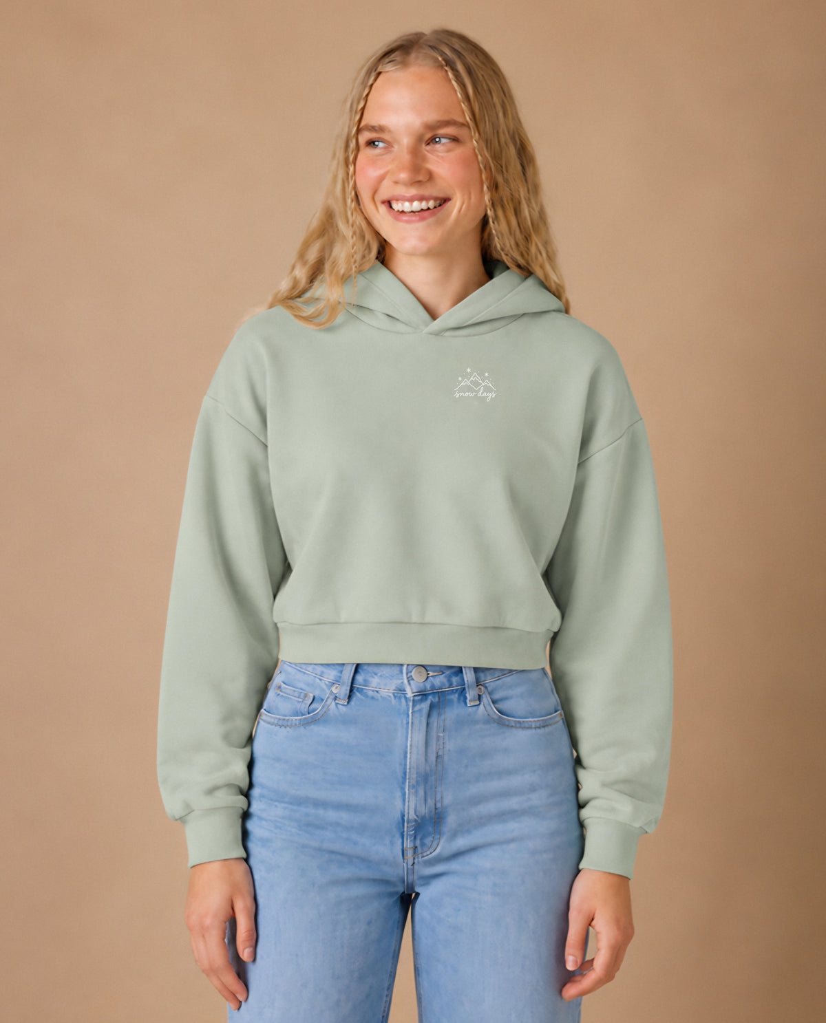 Snow Days minimalist crop hoodie for women in Matcha, worn by model, studio photo
