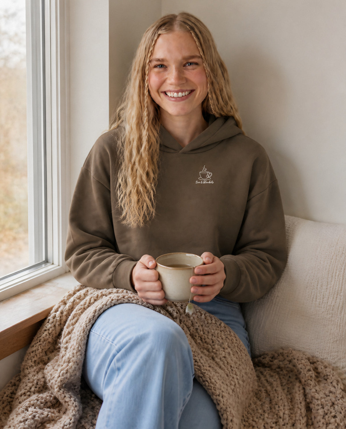 Tea & Blankets minimalist crop hoodie for women in Coffee, worn by model, lifestyle photo