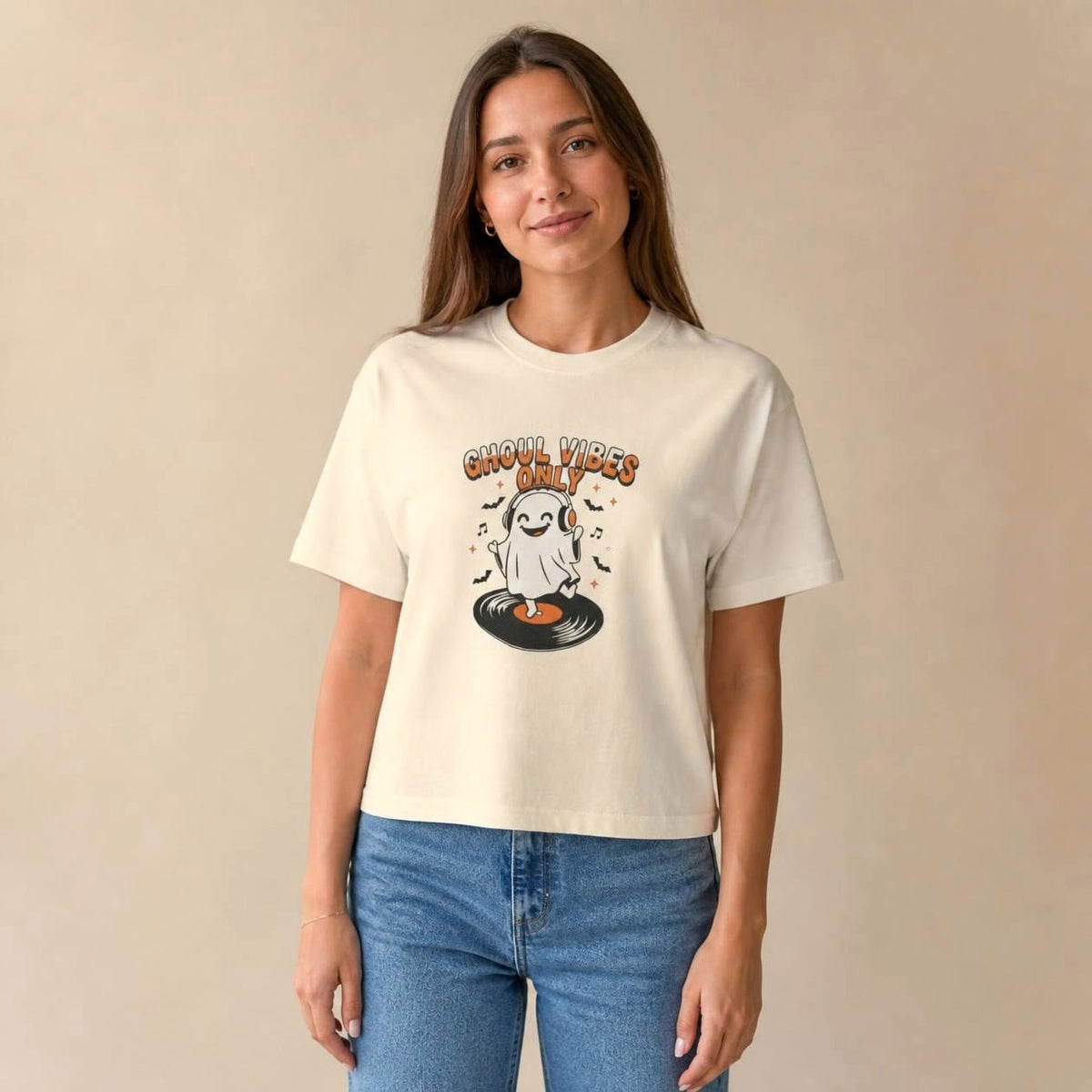 Model wearing the ivory Ghoul Vibes Only Ghost boxy crop tee, studio photo (Color: Ivory)