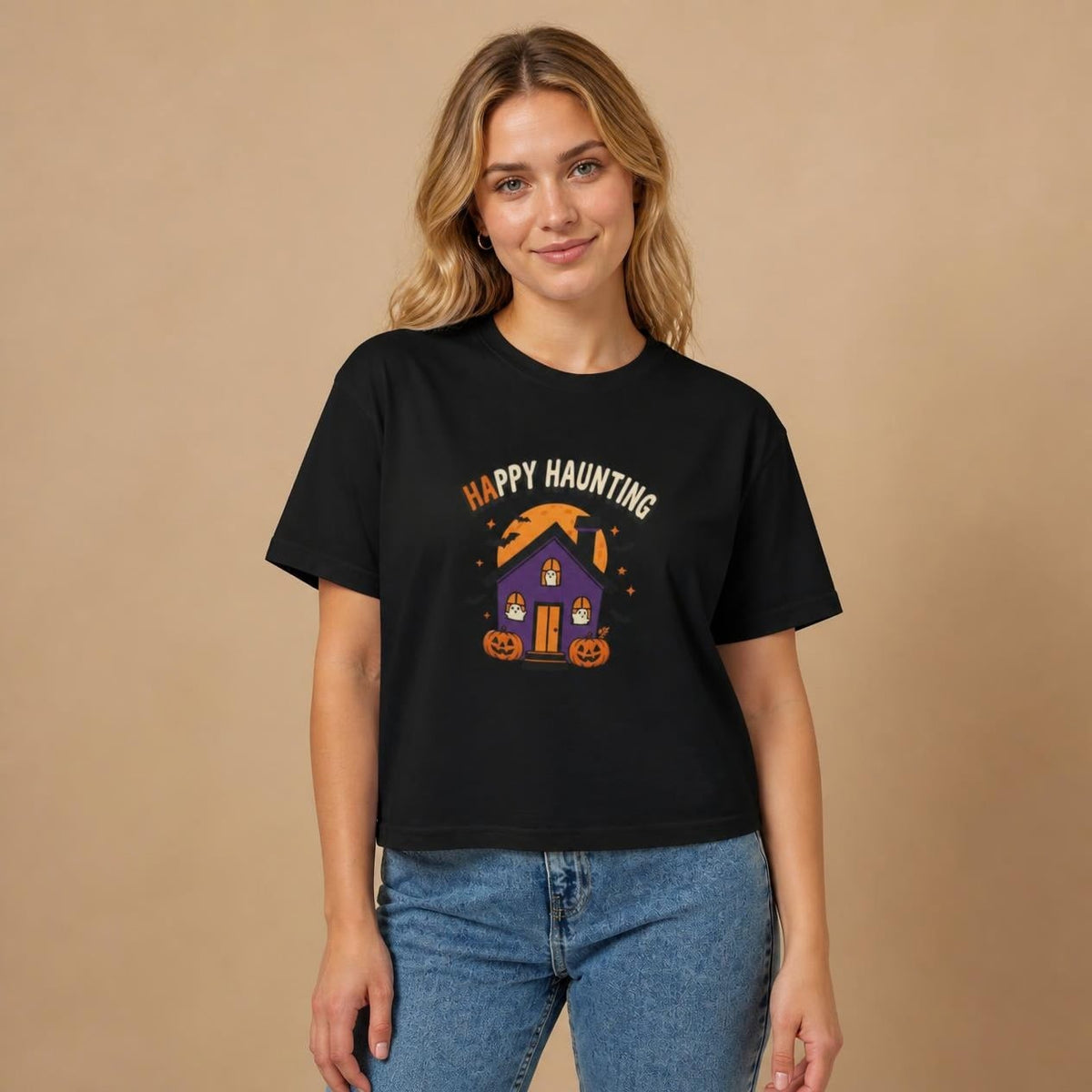 Model wearing the black Happy Haunting Haunted House boxy crop tee, studio photo (Color: Black)