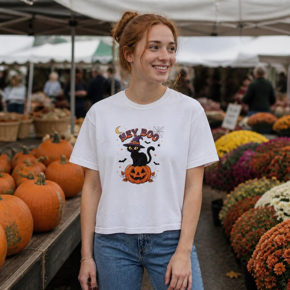 Woman wearing the white Hey Boo Black Cat boxy crop tee, lifestyle photo (Color: White)