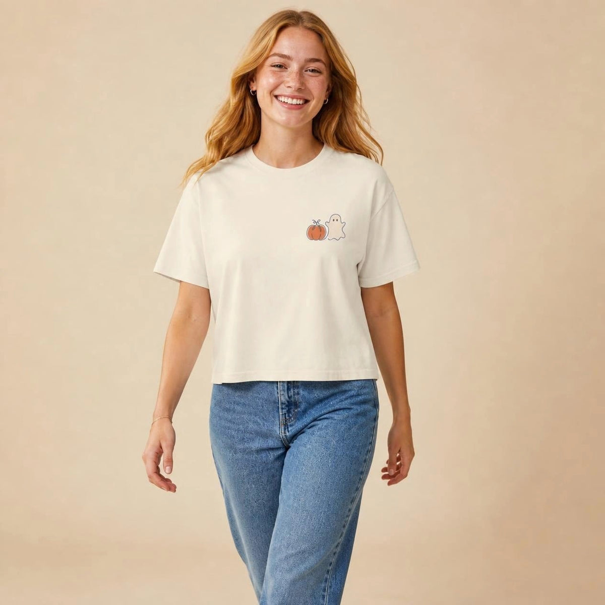 Model wearing the ivory Pumpkin Ghost boxy crop tee, studio photo (Color: Ivory)