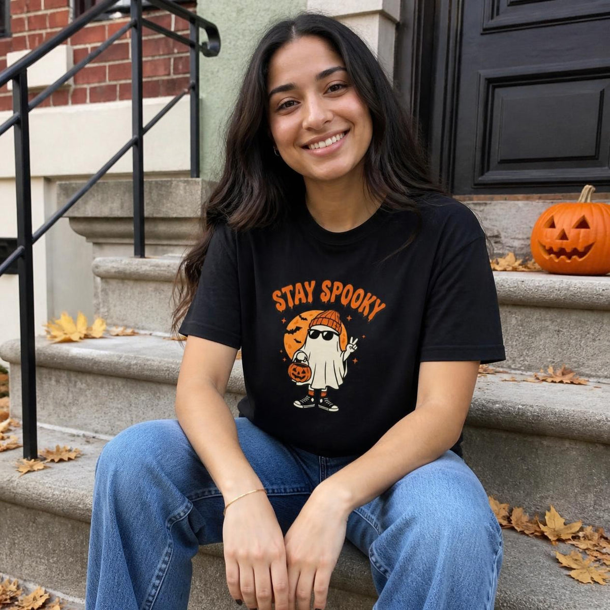 Woman wearing the black Stay Spooky Ghost boxy crop tee, lifestyle photo (Color: Black)