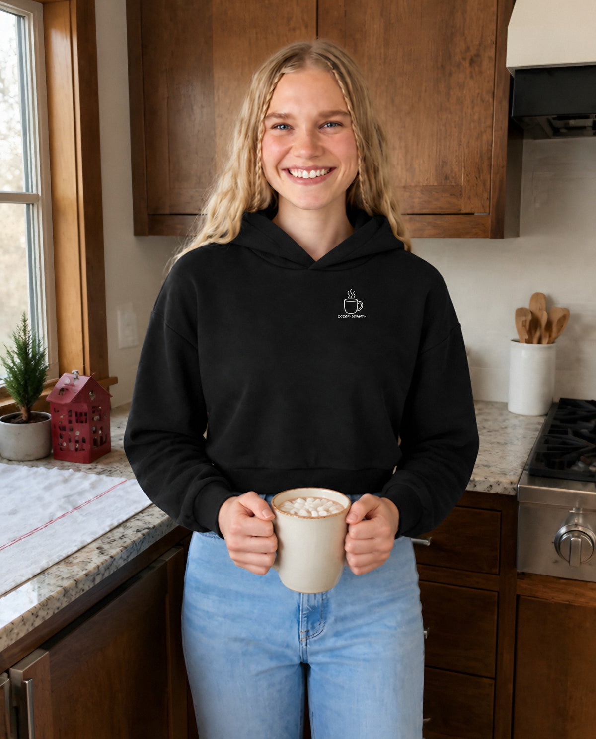 Cocoa Season minimalist crop hoodie for women in Black, worn by model, lifestyle photo