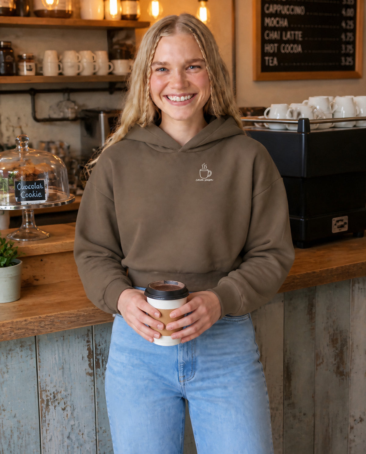Cocoa Season minimalist crop hoodie for women in Coffee, worn by model, lifestyle photo