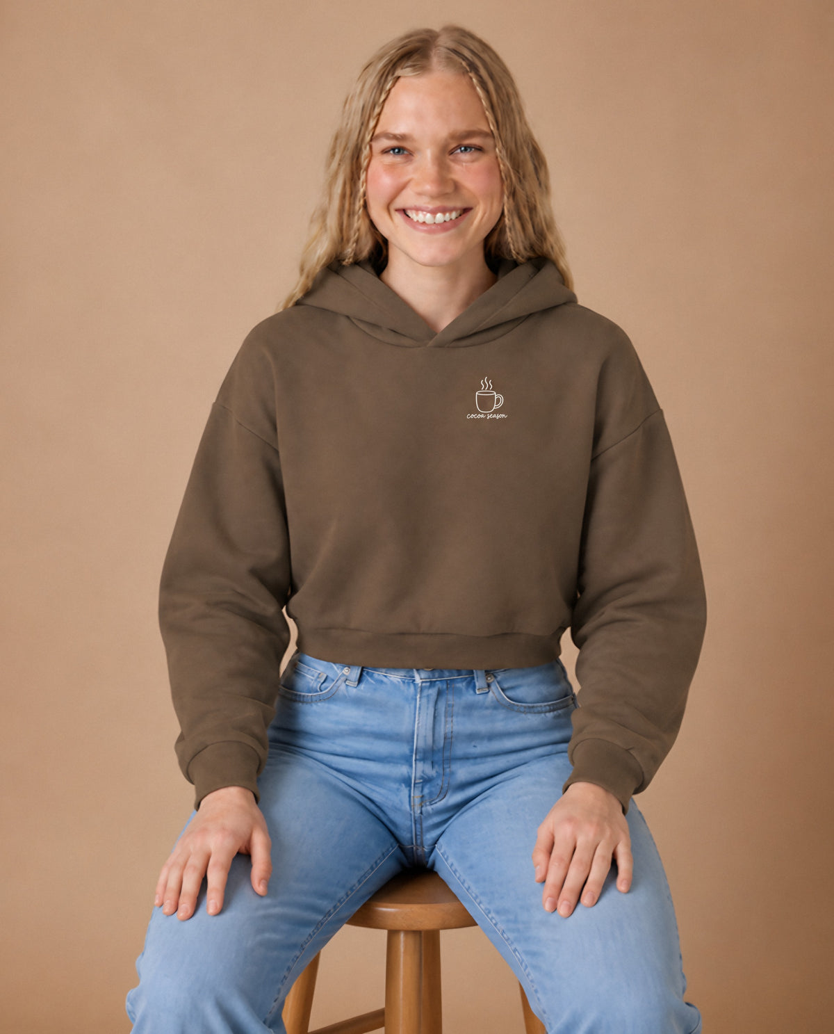 Cocoa Season minimalist crop hoodie for women in Coffee, worn by model, studio photo