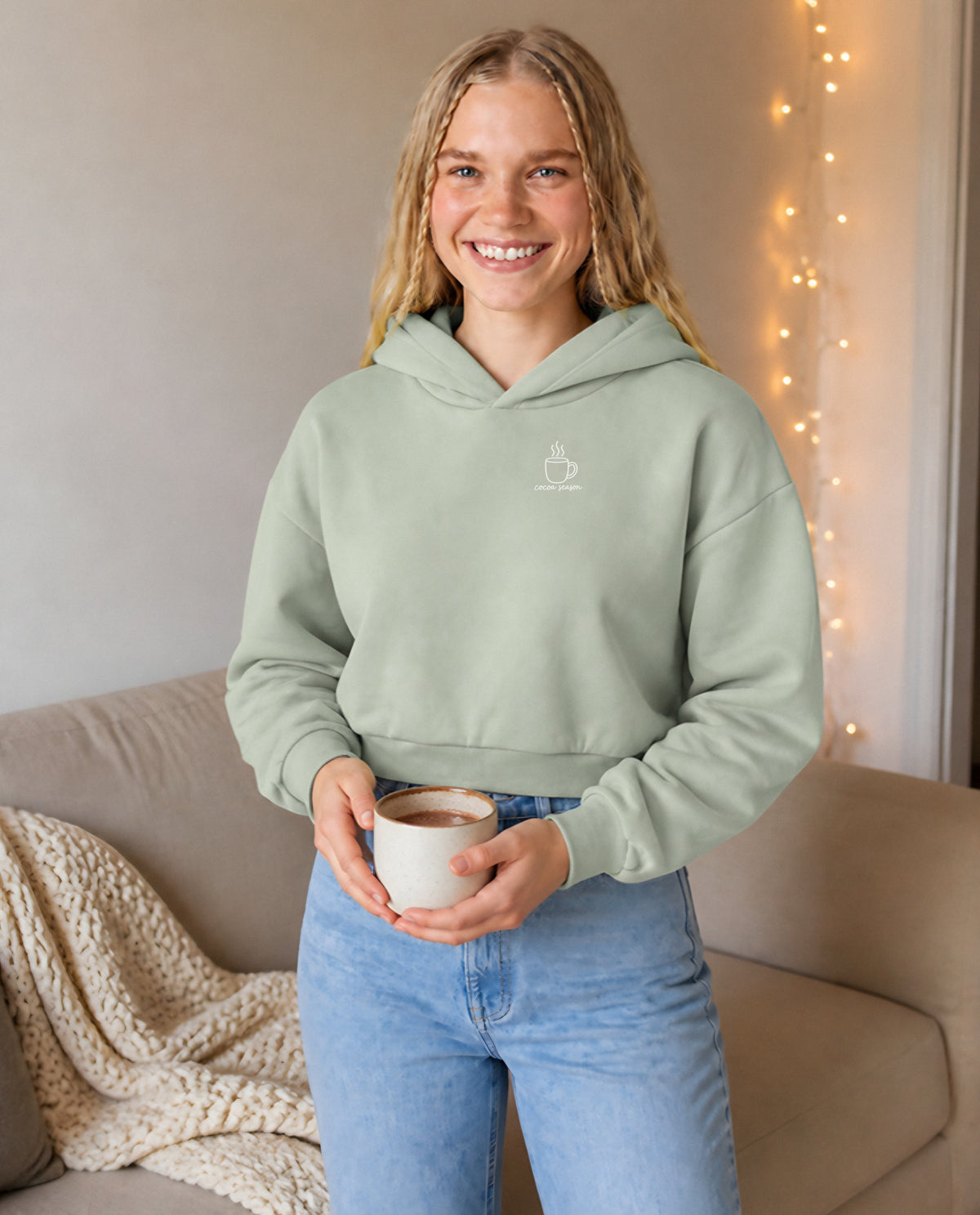 Cocoa Season minimalist crop hoodie for women in Matcha, worn by model, lifestyle photo
