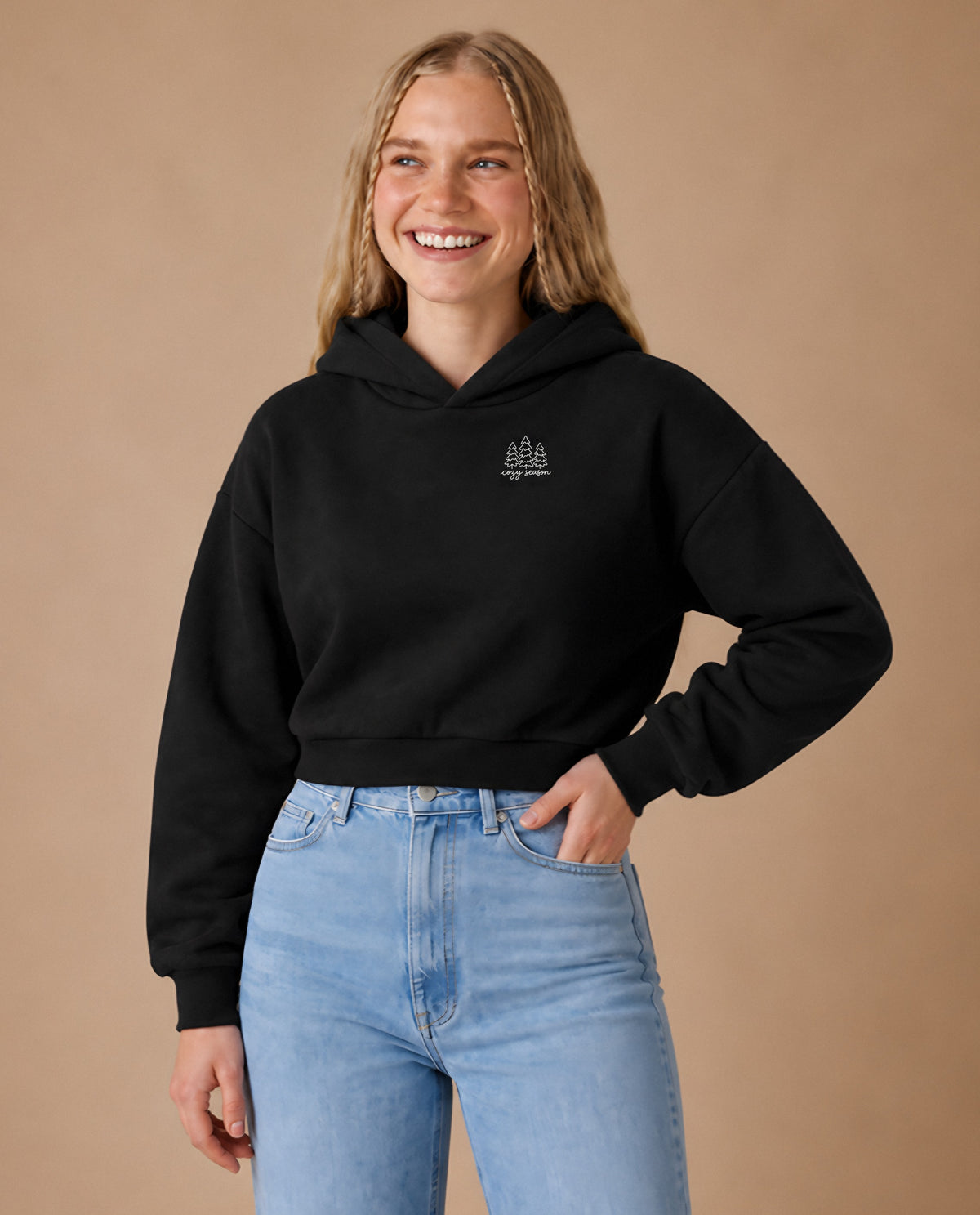 Cozy Season minimalist crop hoodie for women in Black, worn by model, studio photo