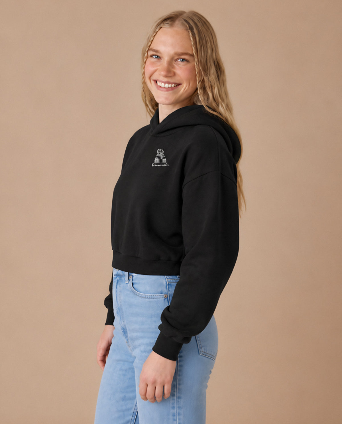 Beanie Weather minimalist crop hoodie for women in Black, worn by model, studio photo