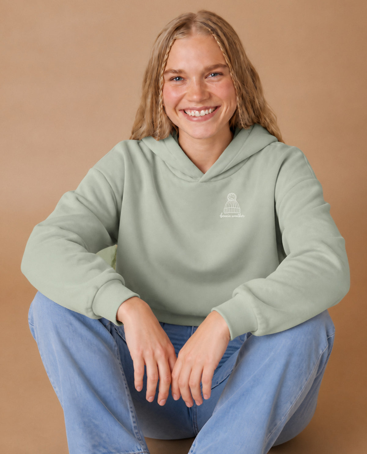 Beanie Weather minimalist crop hoodie for women in Matcha, worn by model, studio photo