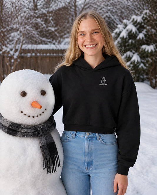 Chill Vibes minimalist crop hoodie for women in Black, worn by model, lifestyle photo