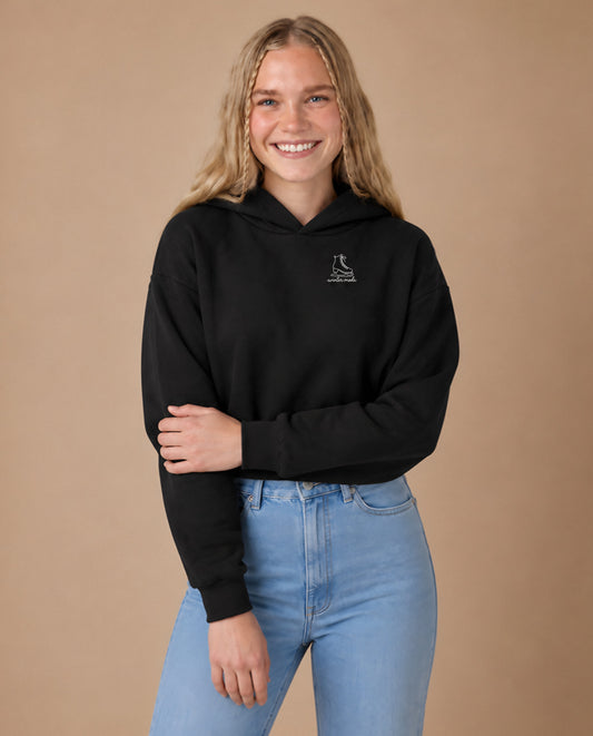 Winter Mode minimalist crop hoodie for women in Black, worn by model, studio photo