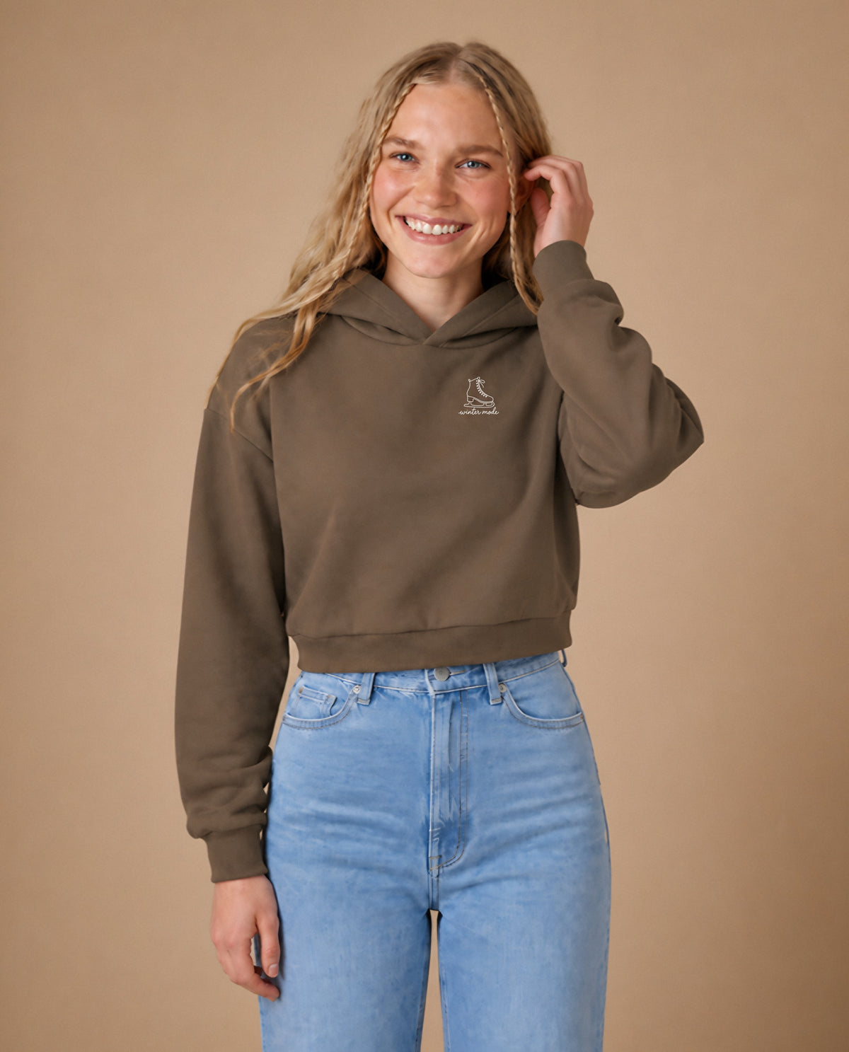 Winter Mode minimalist crop hoodie for women in Coffee, worn by model, studio photo