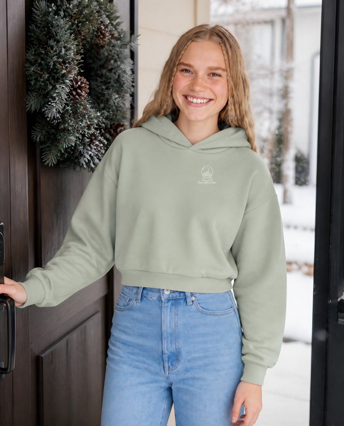 Home for Winter minimalist crop hoodie for women in Matcha, worn by model, lifestyle photo
