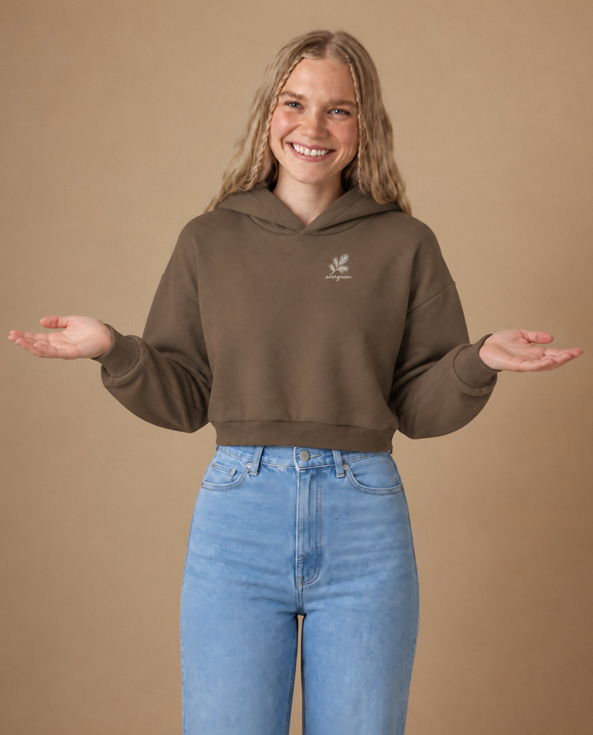 Evergreen minimalist crop hoodie for women in Coffee, worn by model, studio photo