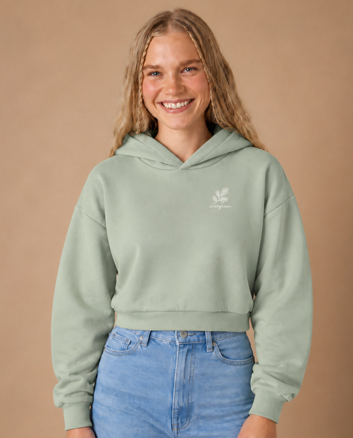Evergreen minimalist crop hoodie for women in Matcha, worn by model, studio photo
