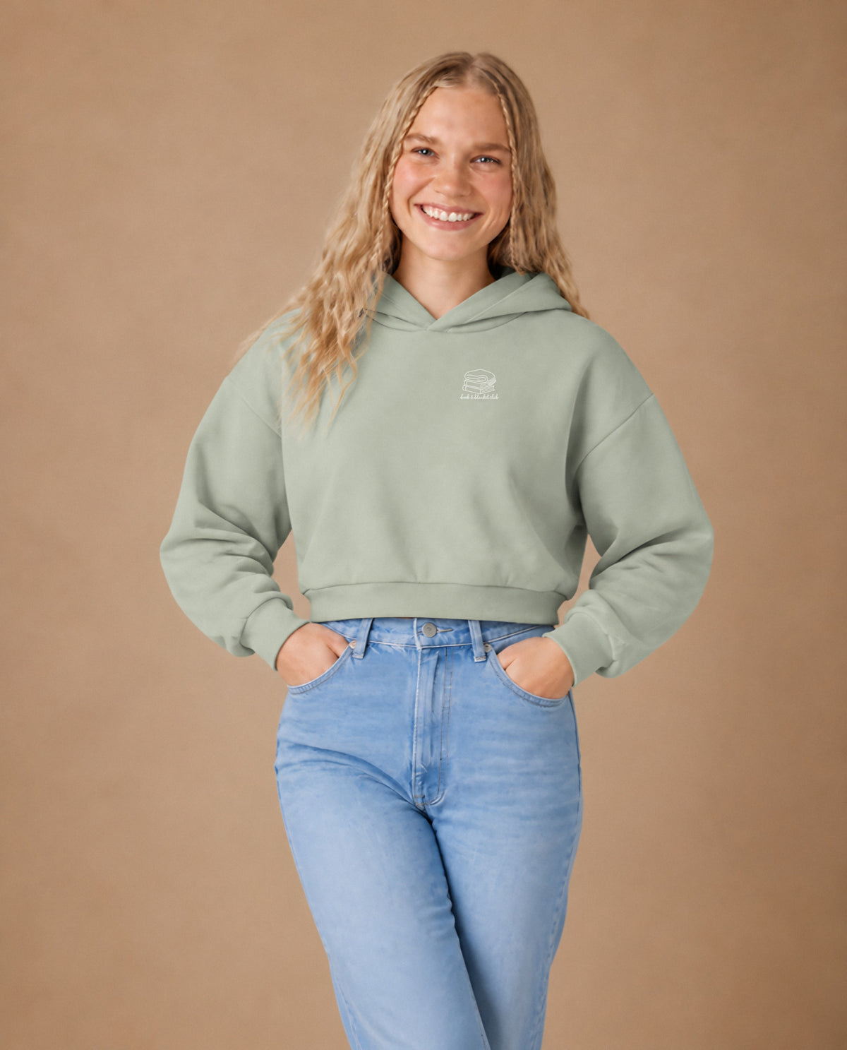 Book & Blanket Club minimalist crop hoodie for women in Matcha, worn by model, studio photo