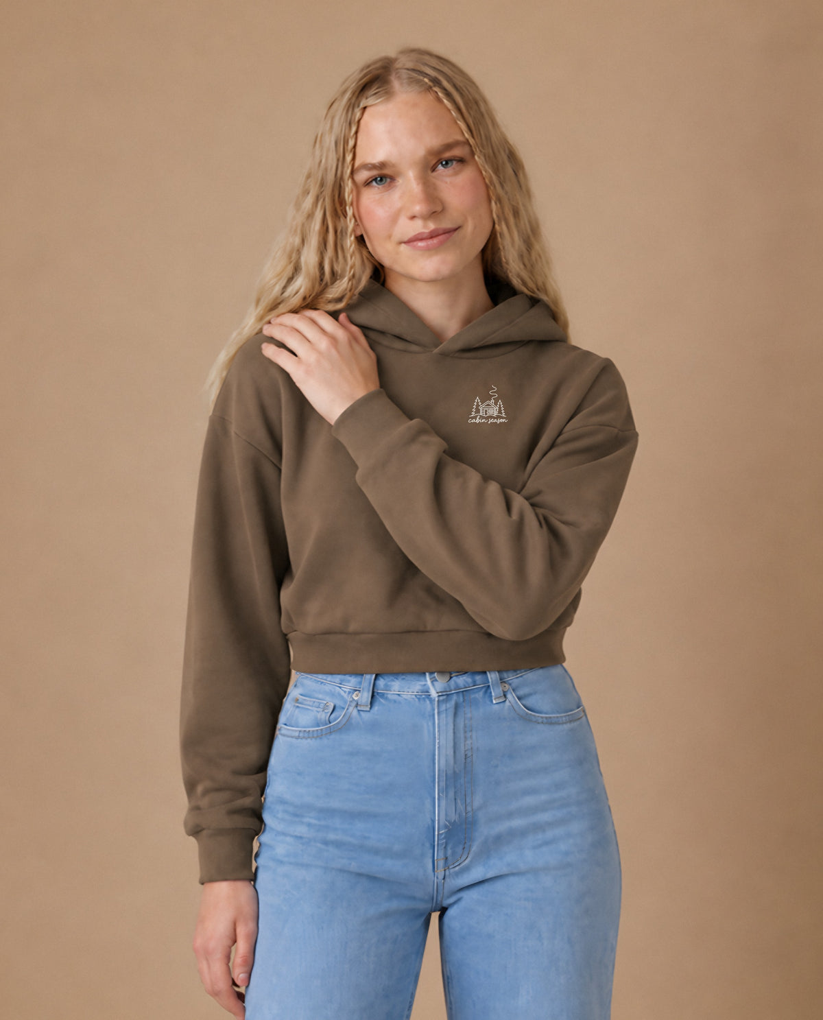 Cabin Season minimalist crop hoodie for women in Coffee, worn by model, studio photo