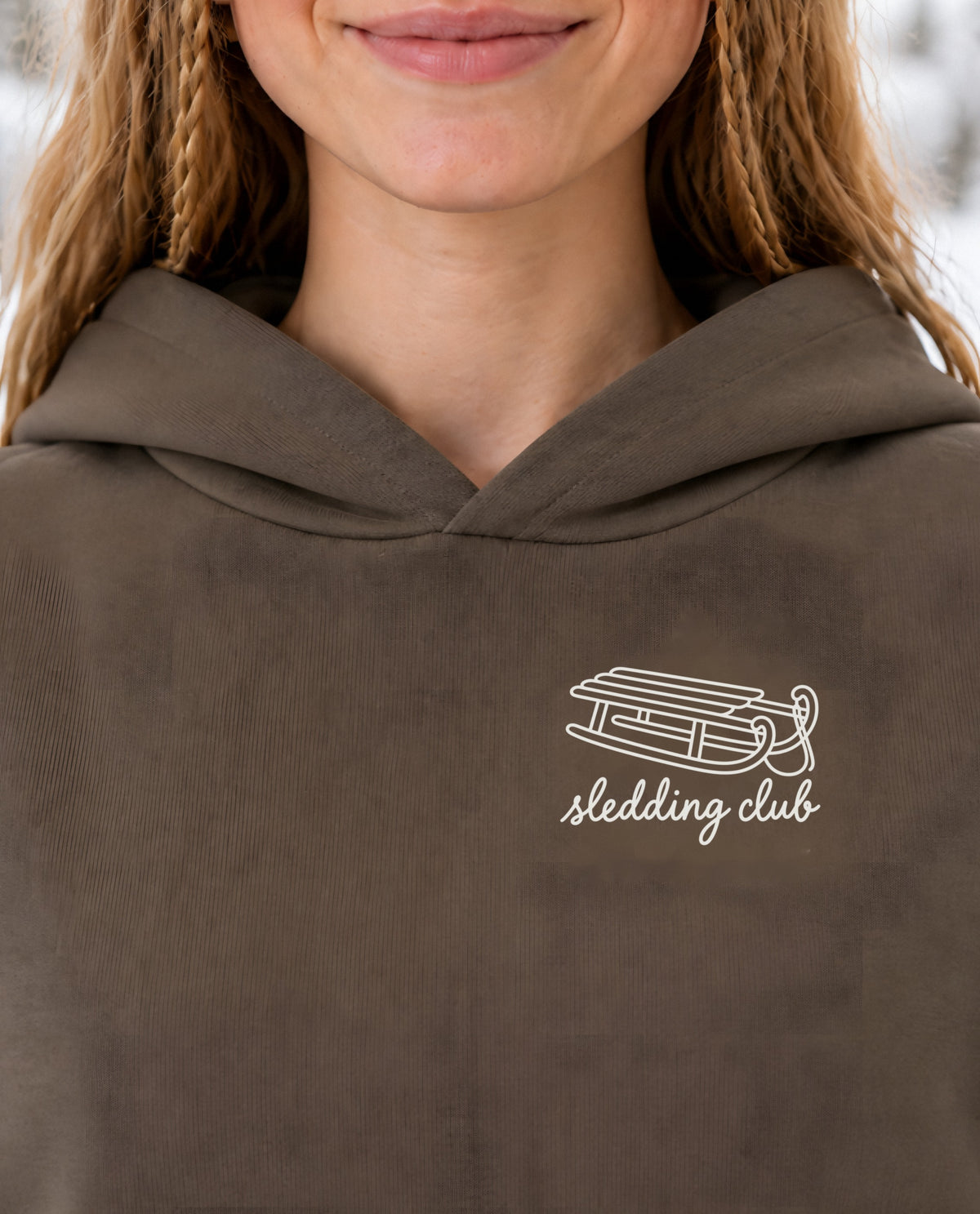 Sledding Club minimalist crop hoodie for women in Coffee, print close-up
