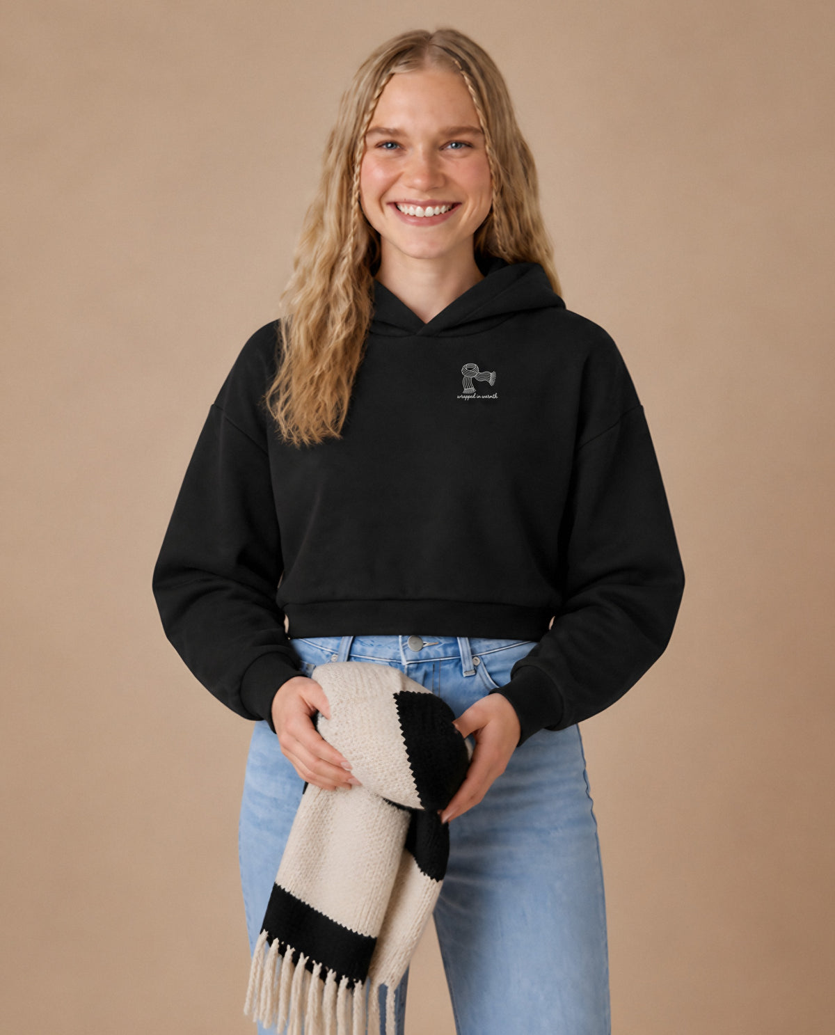 Wrapped in Warmth minimalist crop hoodie for women in Black, worn by model, studio photo