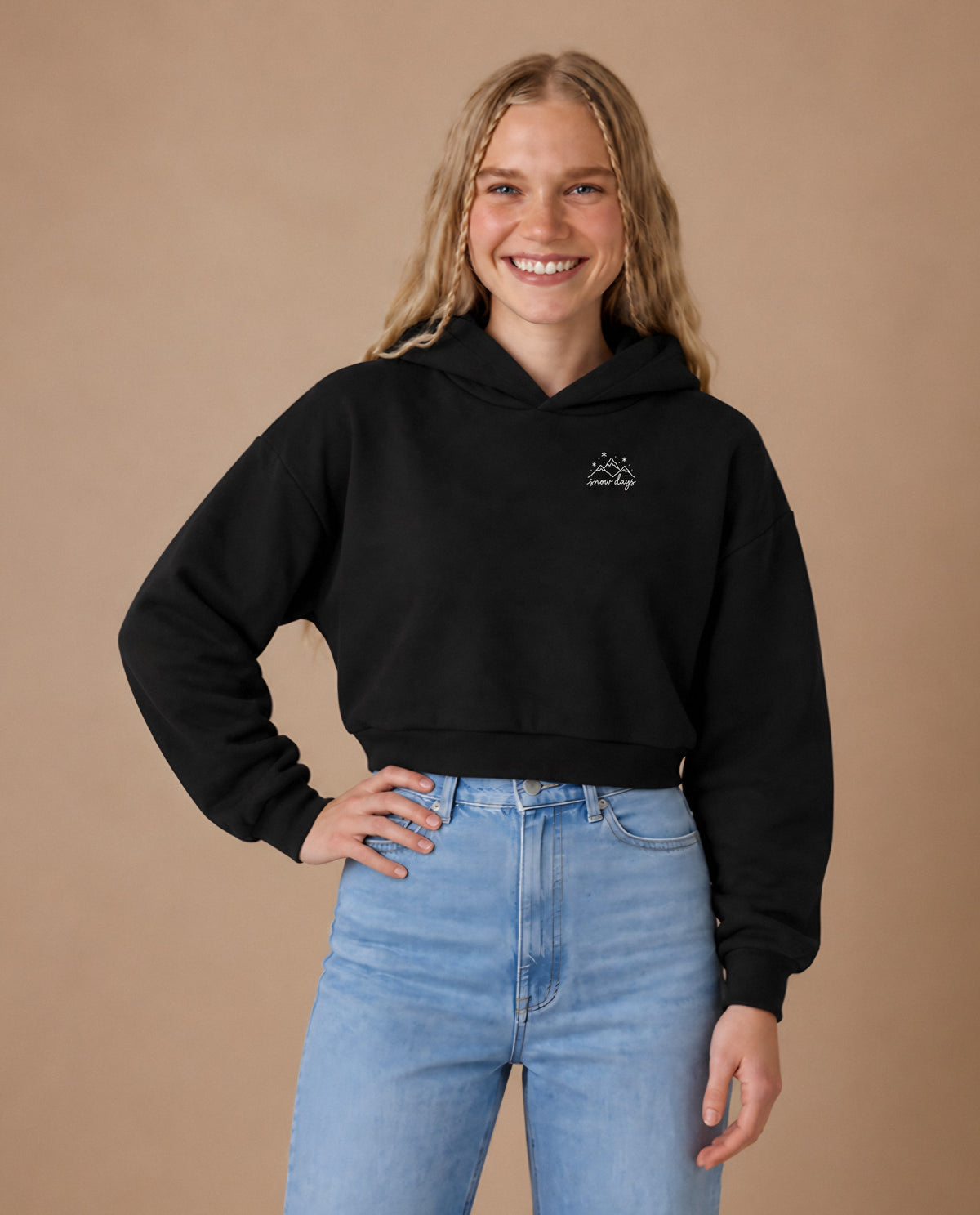 Snow Days minimalist crop hoodie for women in Black, worn by model, studio photo