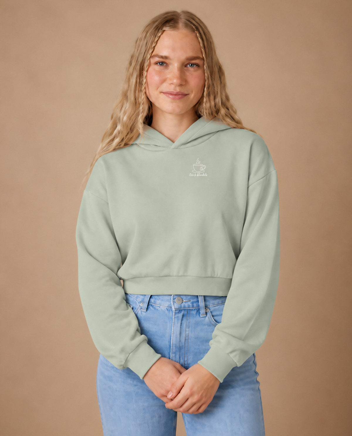 Tea & Blankets minimalist crop hoodie for women in Matcha, worn by model, studio photo