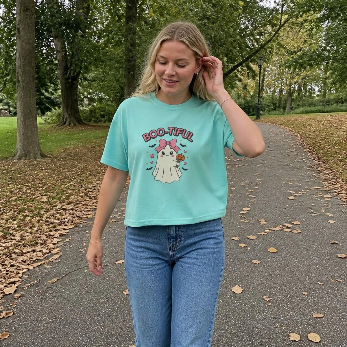 Woman wearing the chalky mint Boo-tiful Ghost boxy crop tee, lifestyle photo (Color: Chalky Mint)