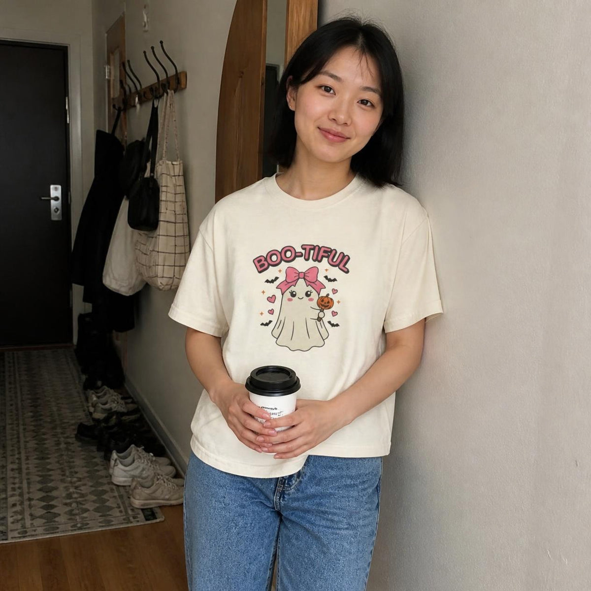 Woman wearing the ivory Boo-tiful Ghost boxy crop tee, lifestyle photo (Color: Ivory)
