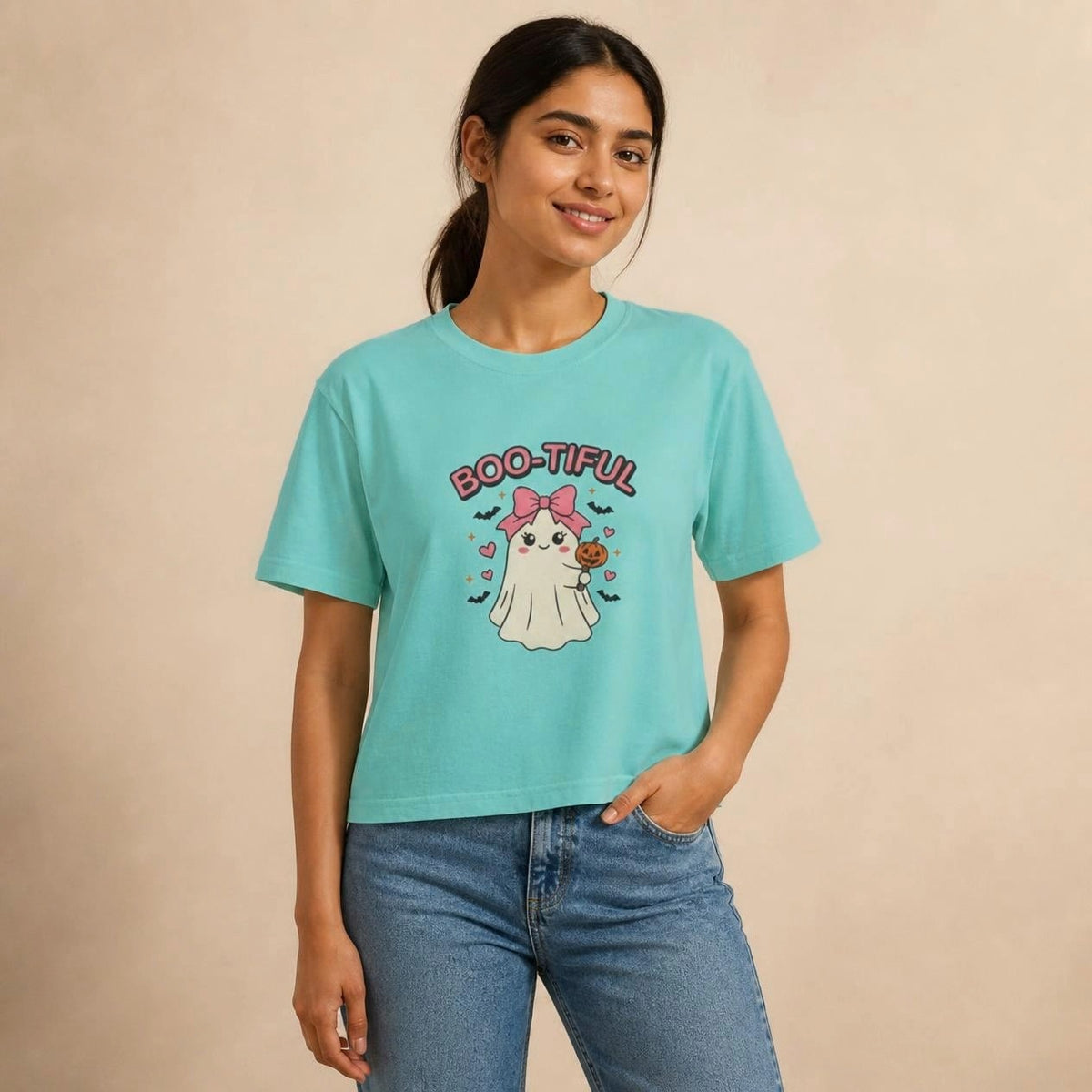 Model wearing the chalky mint Boo-tiful Ghost boxy crop tee, studio photo (Color: Chalky Mint)
