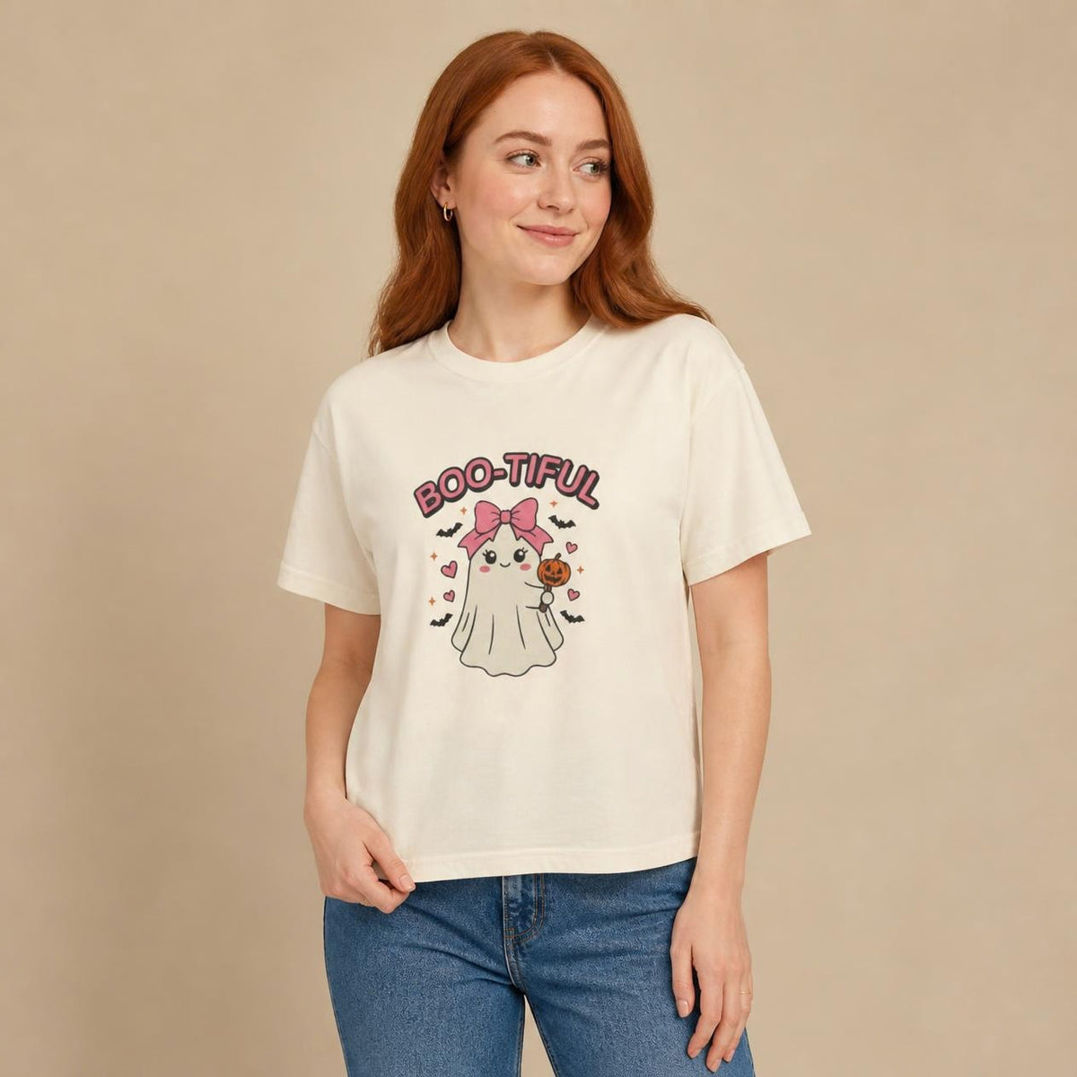 Model wearing the ivory Boo-tiful Ghost boxy crop tee, studio photo (Color: Ivory)