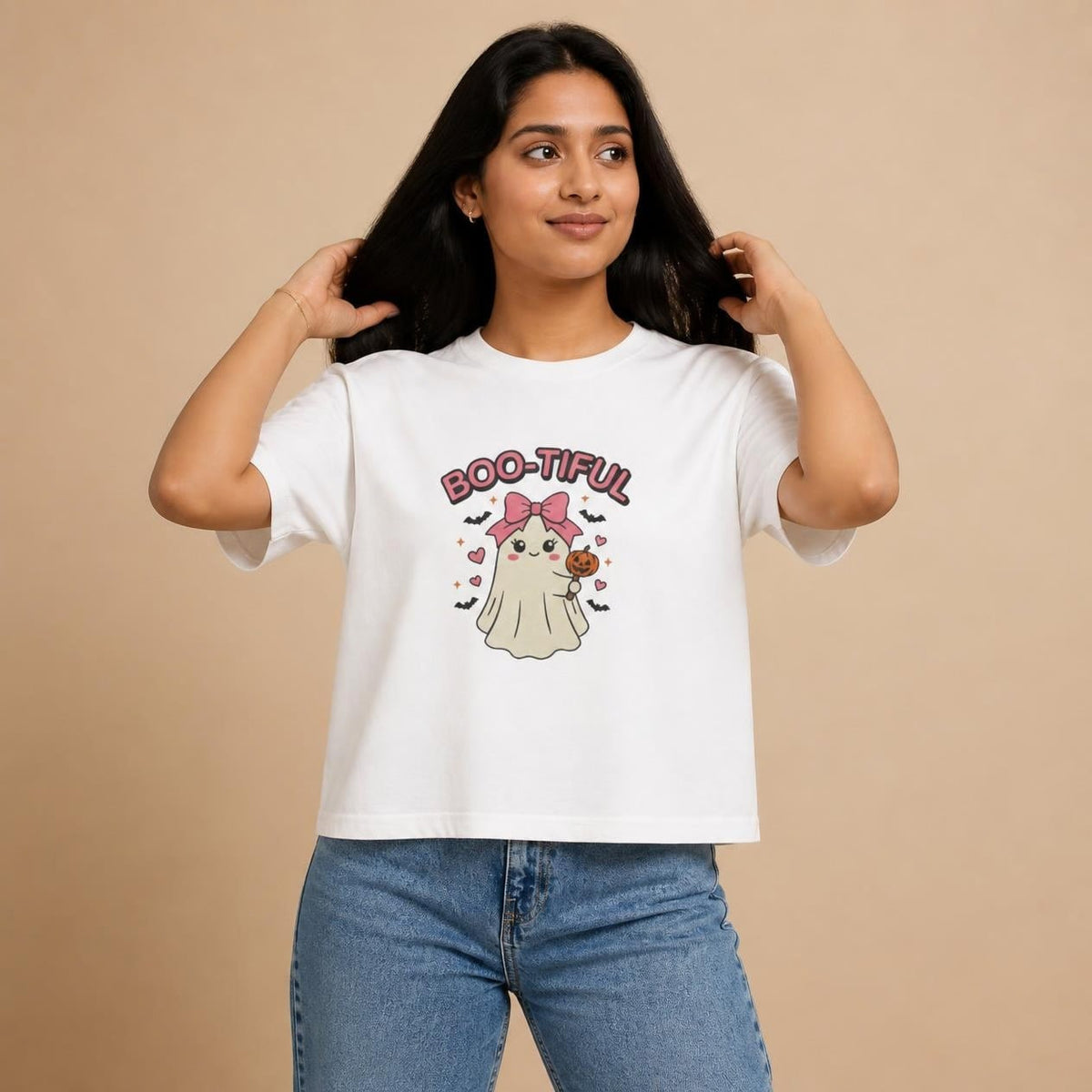 Model wearing the white Boo-tiful Ghost boxy crop tee, studio photo (Color: White)