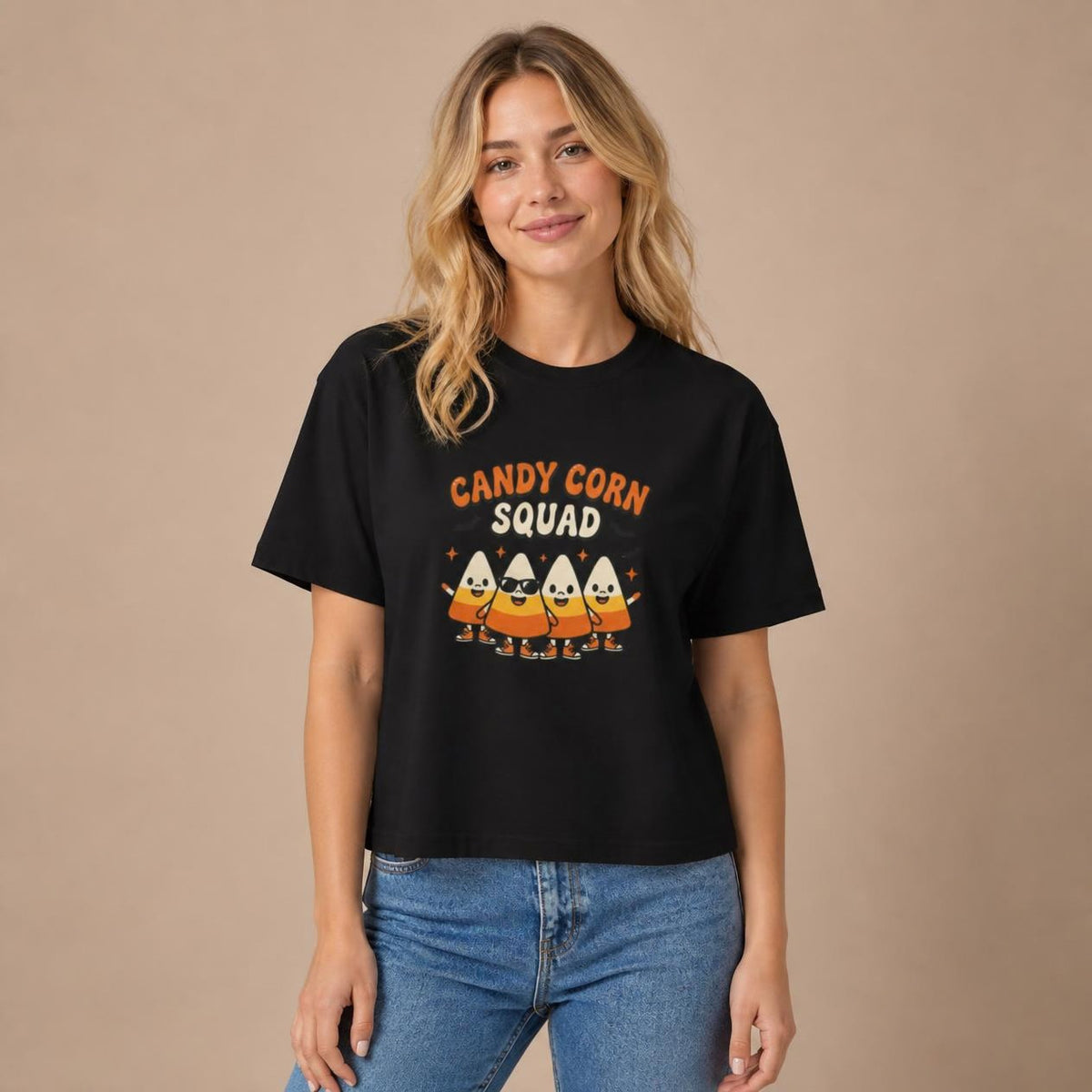 Model wearing the black Candy Corn Squad boxy crop tee, studio photo (Color: Black)