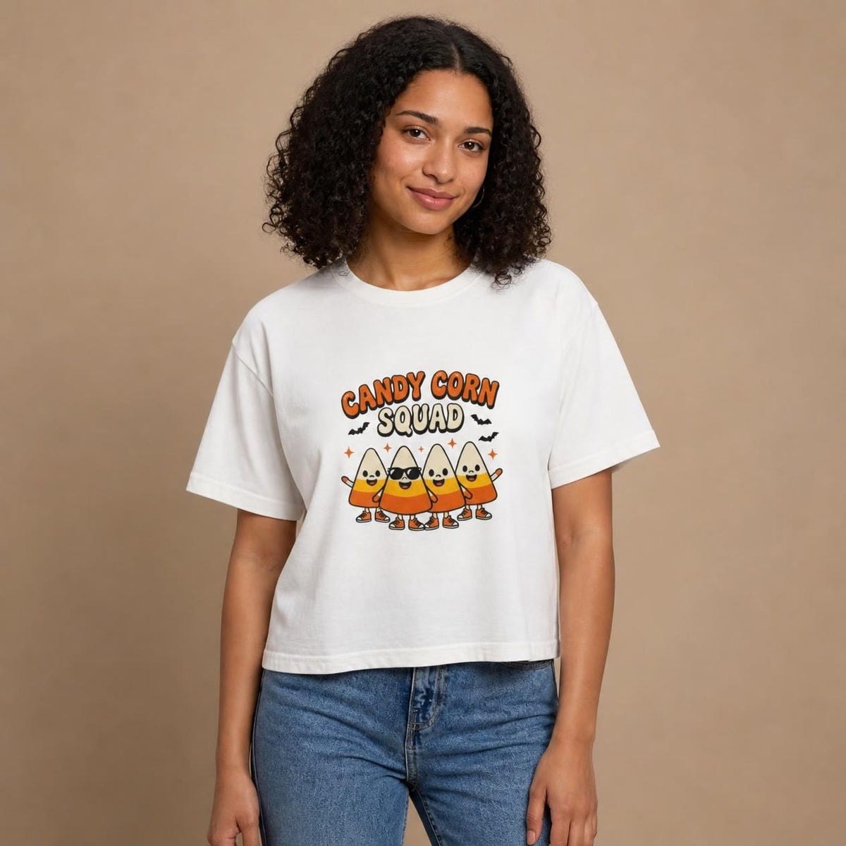 Model wearing the white Candy Corn Squad boxy crop tee, studio photo (Color: White)