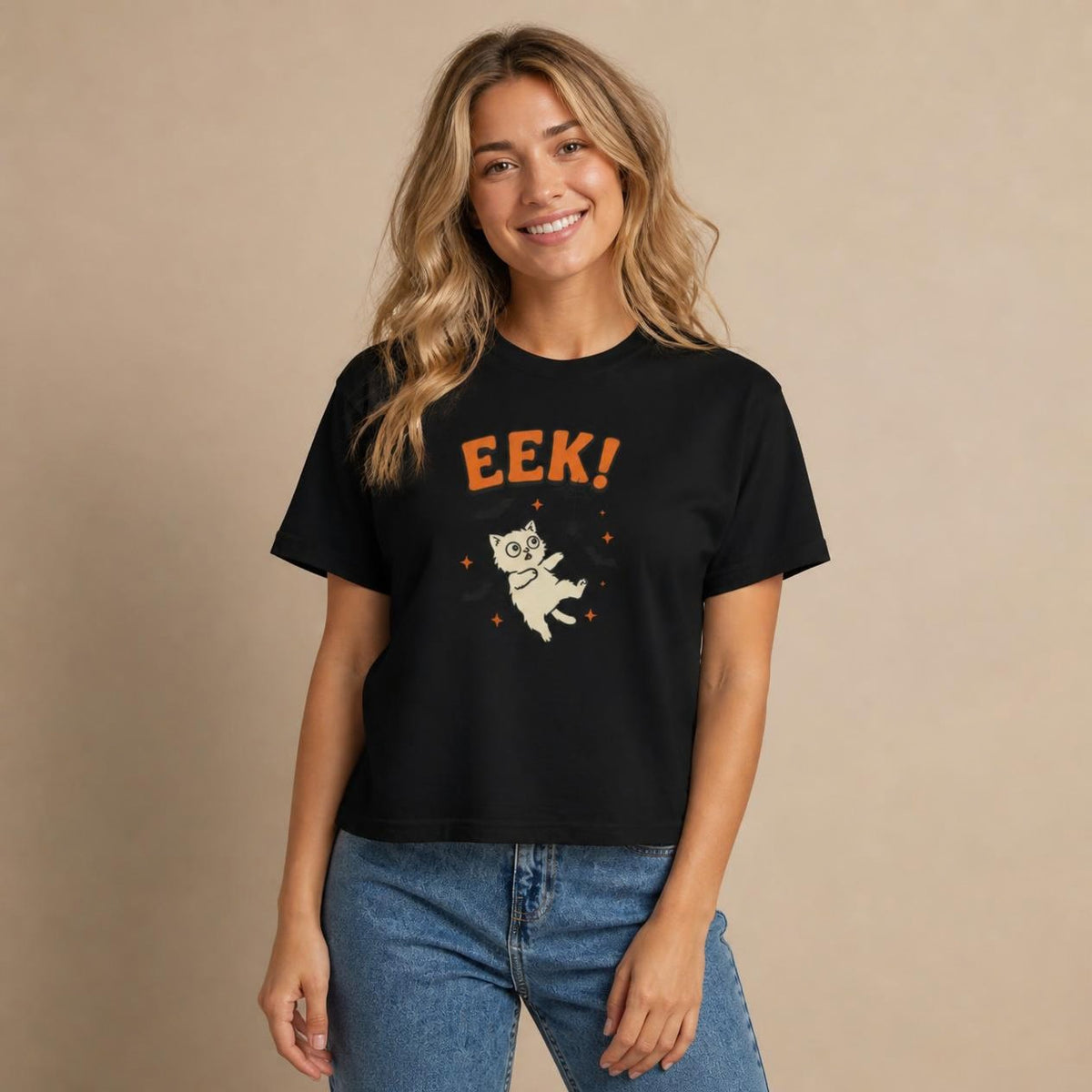 Model wearing the black Eek! Scared Cat boxy crop tee, studio photo (Color: Black)