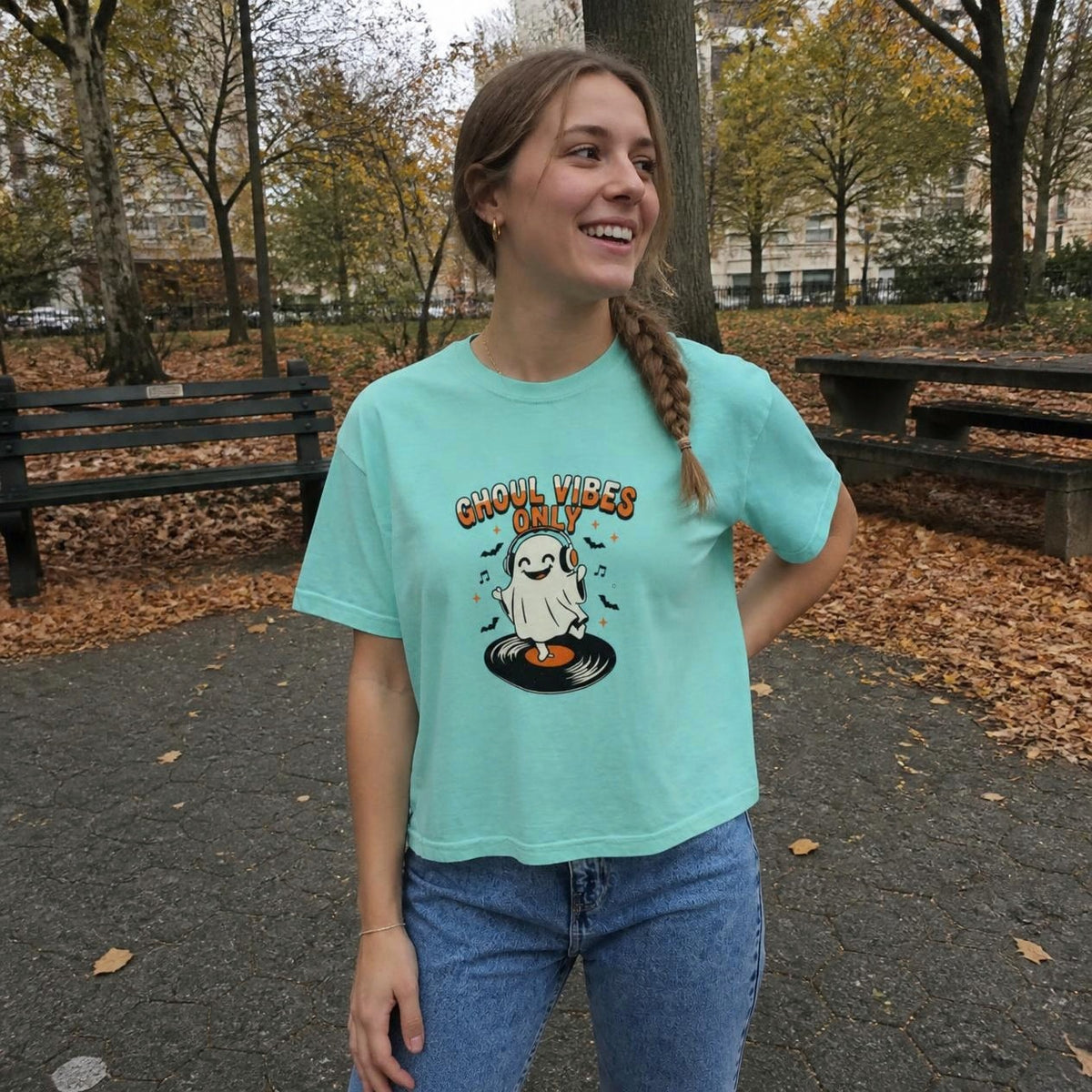 Woman wearing the chalky mint Ghoul Vibes Only Ghost boxy crop tee, lifestyle photo (Color: Chalky Mint)