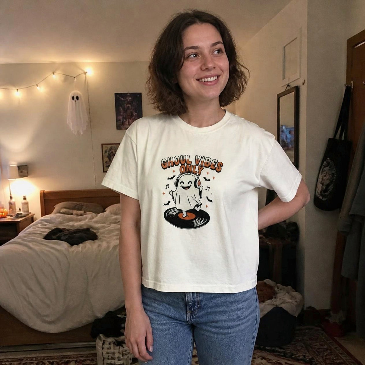 Woman wearing the ivory Ghoul Vibes Only Ghost boxy crop tee, lifestyle photo (Color: Ivory)
