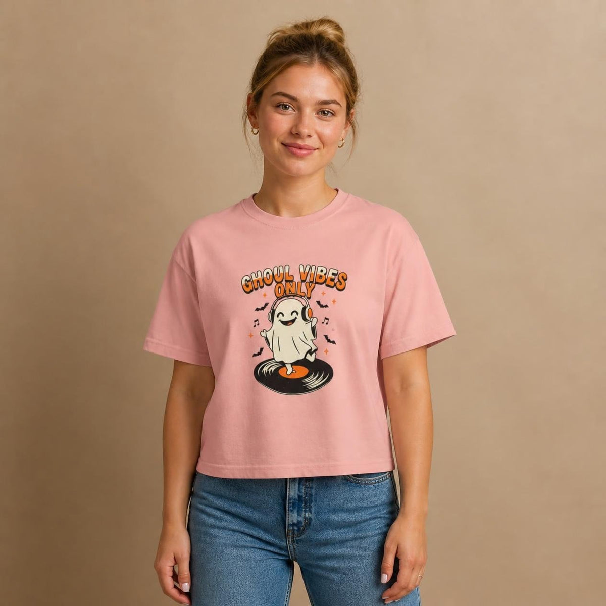Model wearing the peachy Ghoul Vibes Only Ghost boxy crop tee, studio photo (Color: Peachy)
