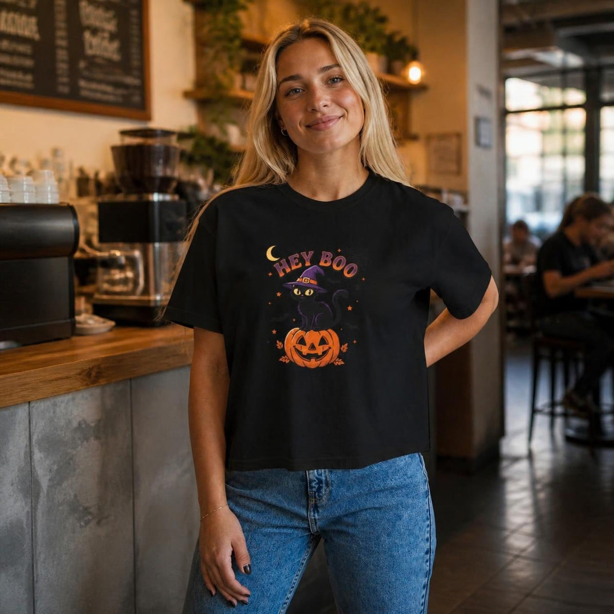 Woman wearing the black Hey Boo Black Cat boxy crop tee, lifestyle photo (Color: Black)