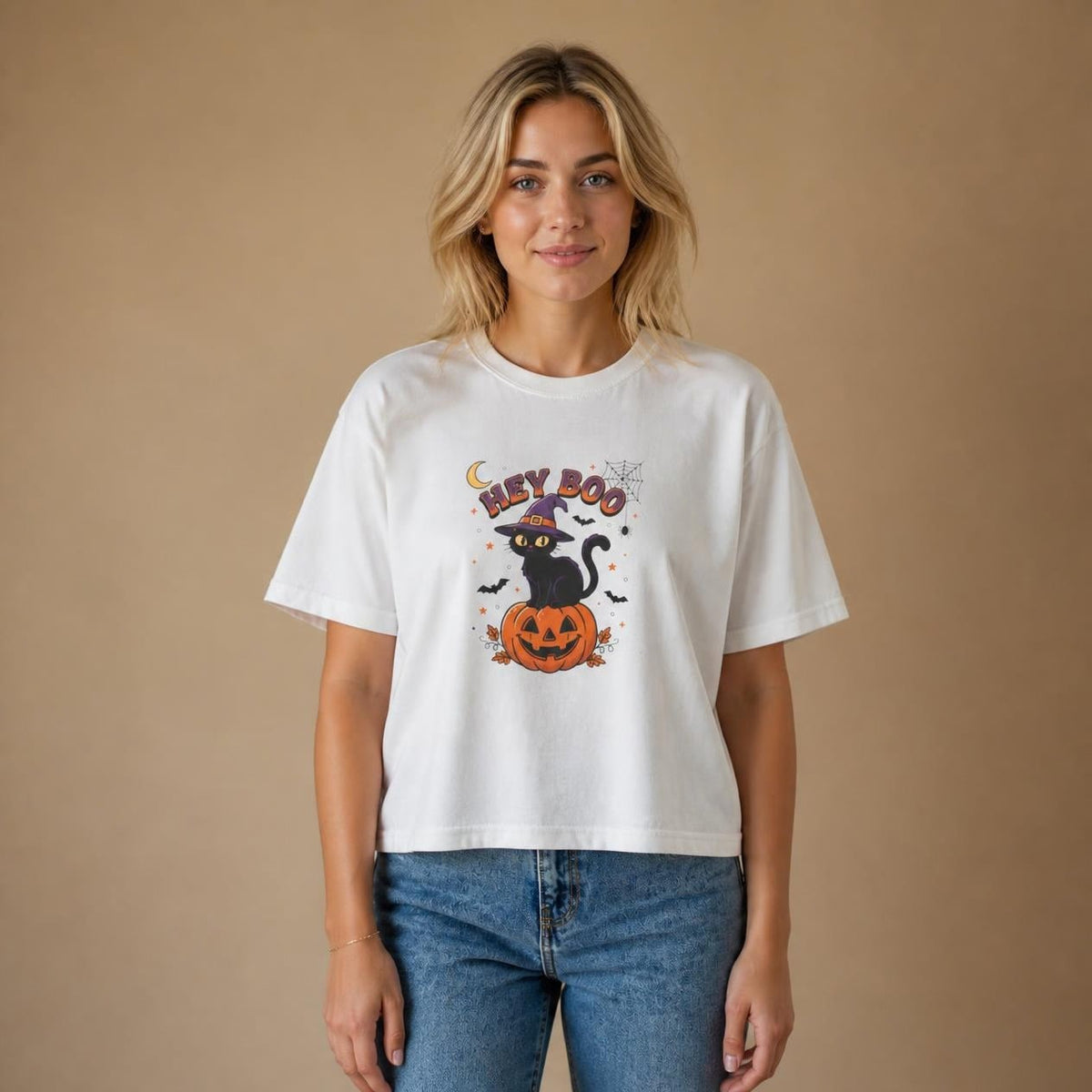 Model wearing the white Hey Boo Black Cat boxy crop tee, studio photo (Color: White)