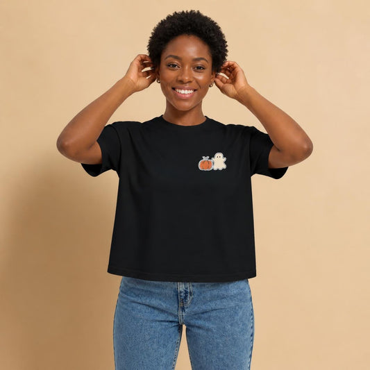 Model wearing the black Pumpkin Ghost boxy crop tee, studio photo (Color: Black)