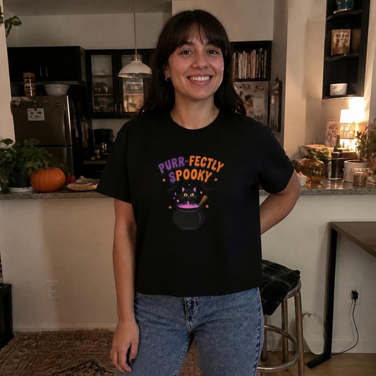 Woman wearing the black Purr-fectly Spooky Black Cat boxy crop tee, lifestyle photo (Color: Black)
