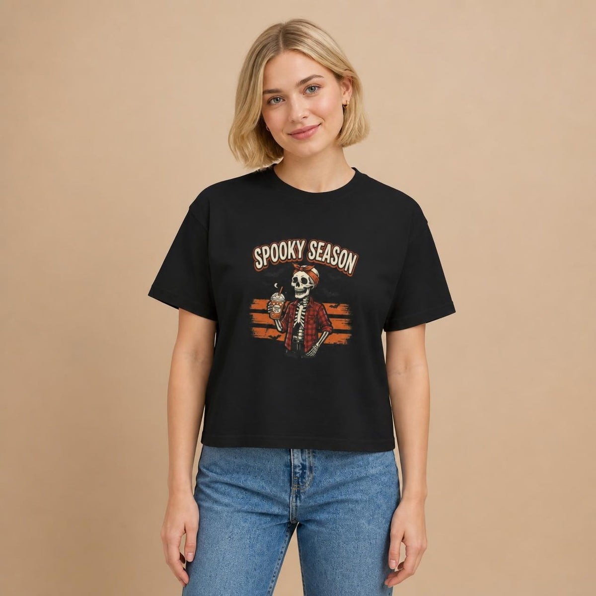 Model wearing the black Spooky Season Skeleton boxy crop tee, studio photo (Color: Black)