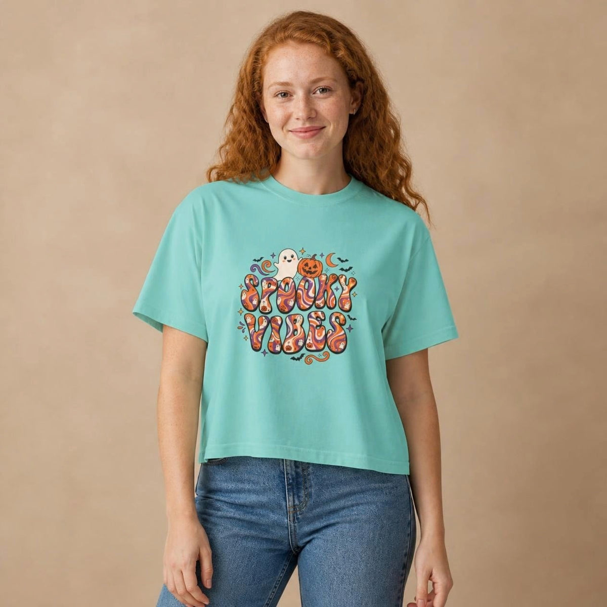 Model wearing the chalky mint Spooky Vibes Retro boxy crop tee, studio photo (Color: Chalky Mint)