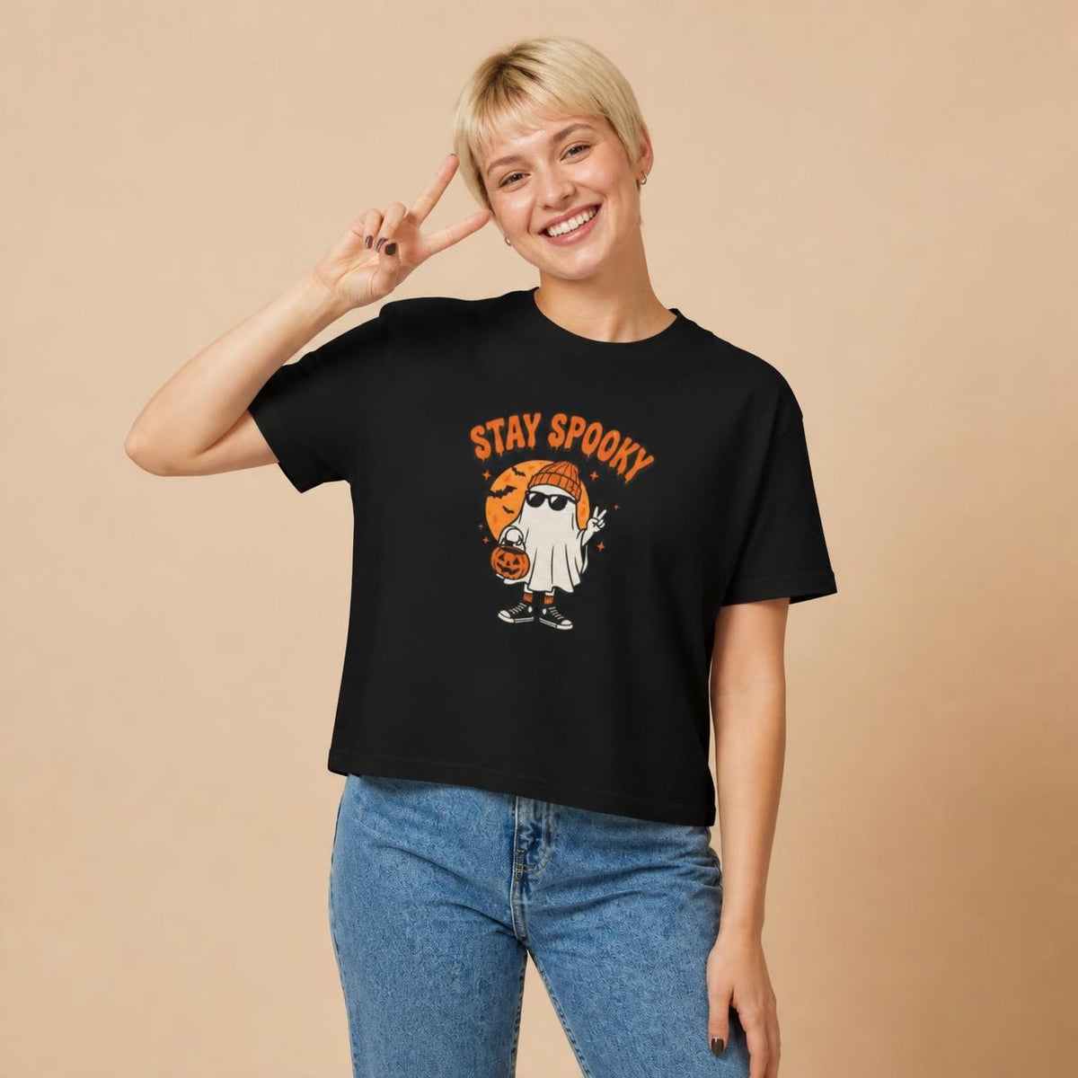 Model wearing the black Stay Spooky Ghost boxy crop tee, studio photo (Color: Black)