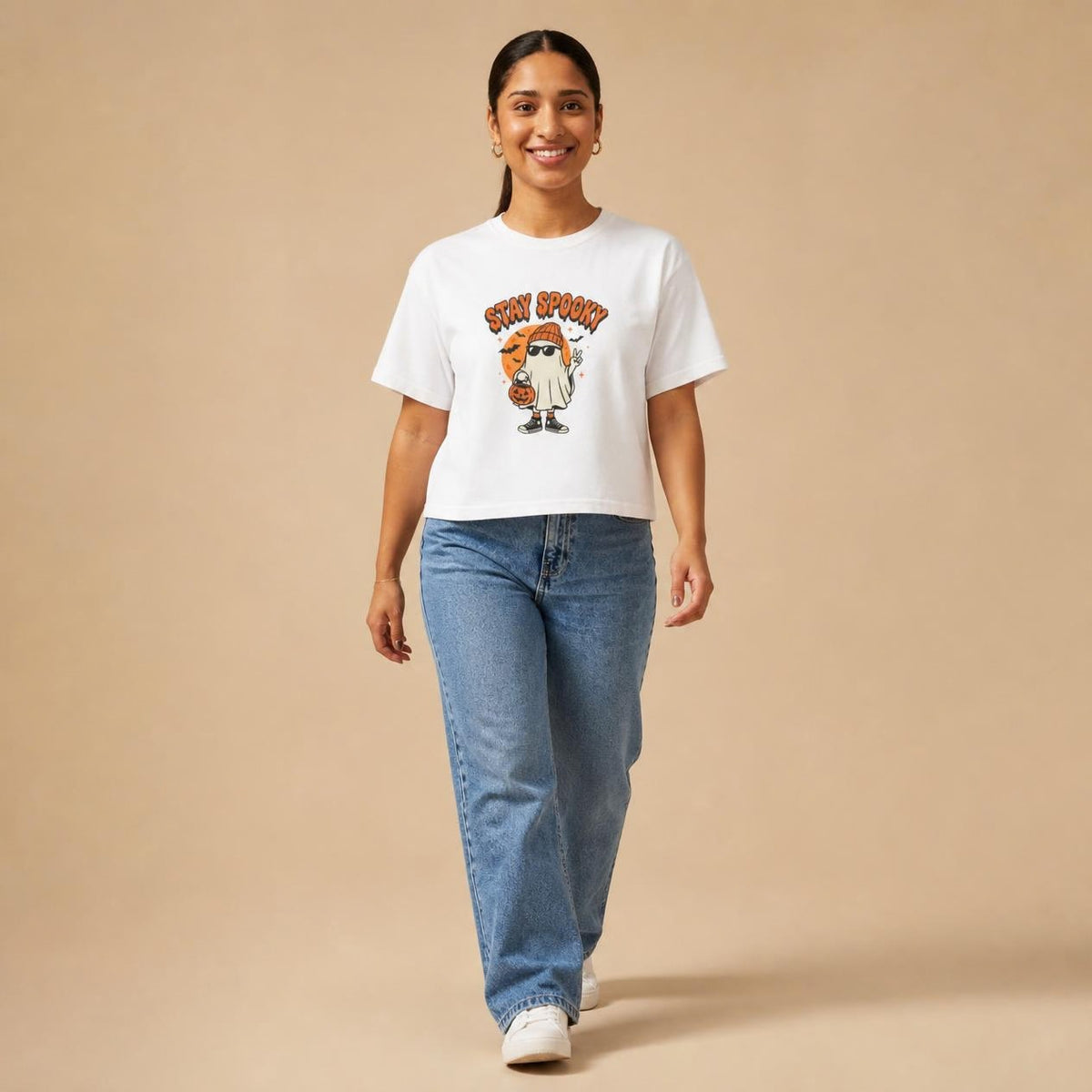 Model wearing the white Stay Spooky Ghost boxy crop tee, studio photo (Color: White)