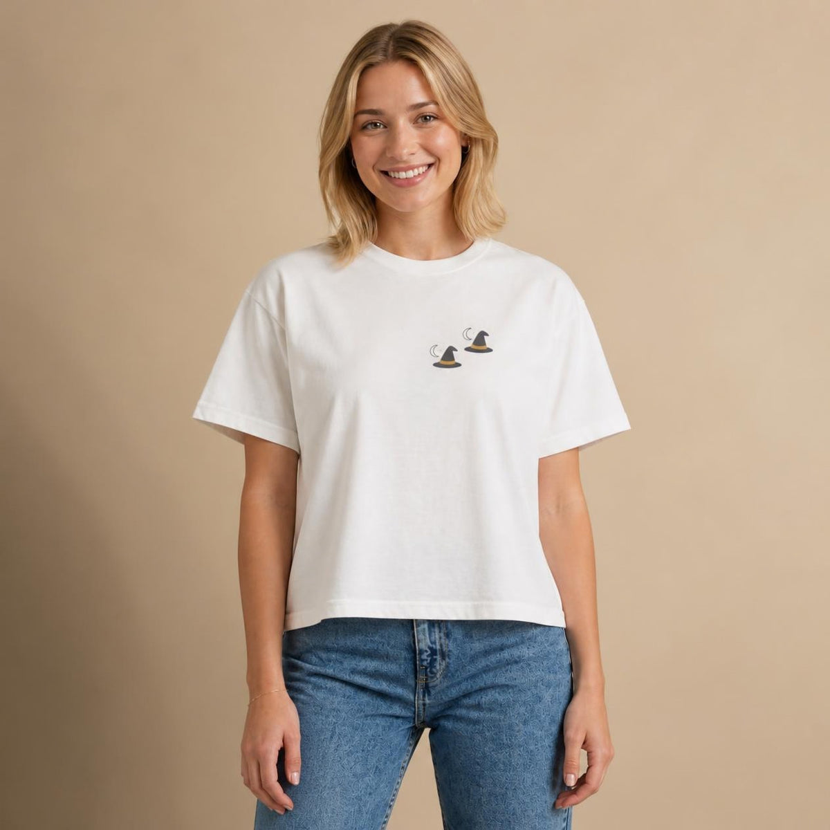 Model wearing the white Witch Hat boxy crop tee, studio photo (Color: White)